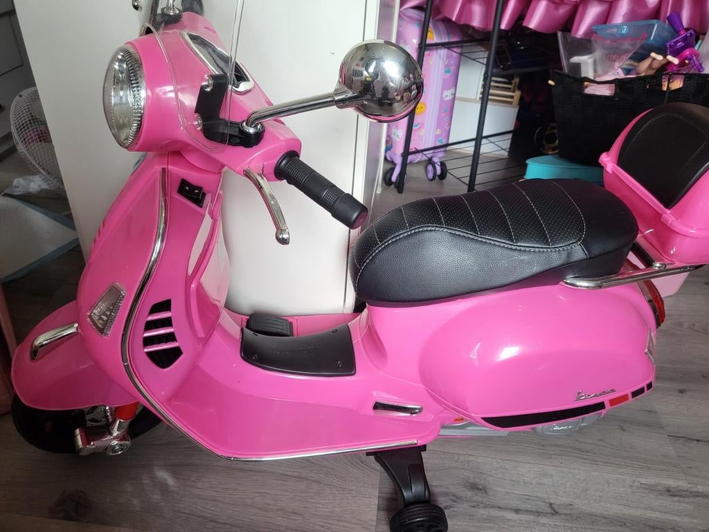 Kinder accu roze brommer, Ophalen