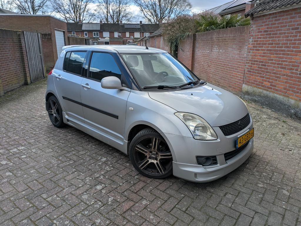 Suzuki Swift 1.5 5D 2008 Grijs Exclusive GT Pakket, Auto's, Suzuki, Voorwielaandrijving, 40 €/maand, 4 cilinders, 400 kg