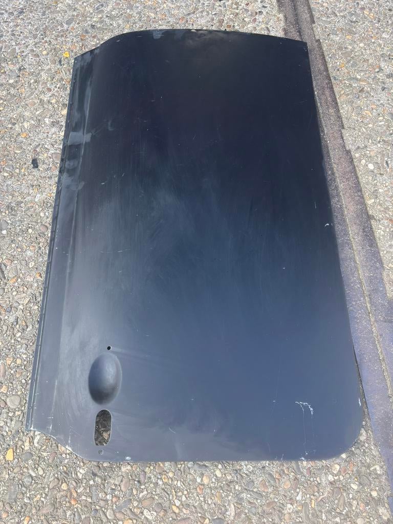 Deurhuid nieuw voor de classic mini, Ophalen