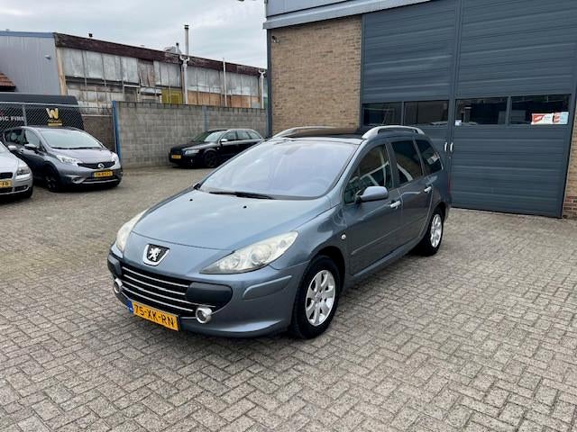 Peugeot 307 SW 1.6-16V Premium + 6 de stoel., Stof, Gebruikt, Zwart, 4 cilinders