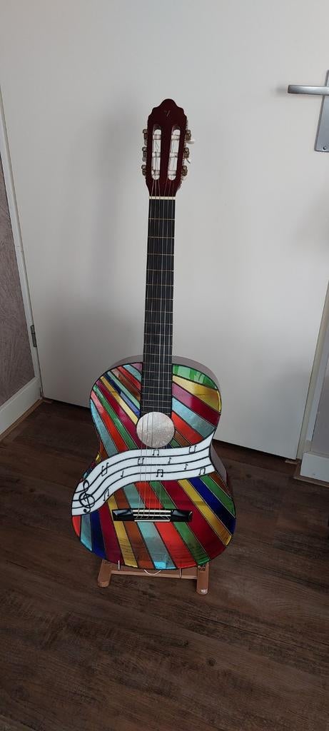 Gitaarlamp., Ophalen