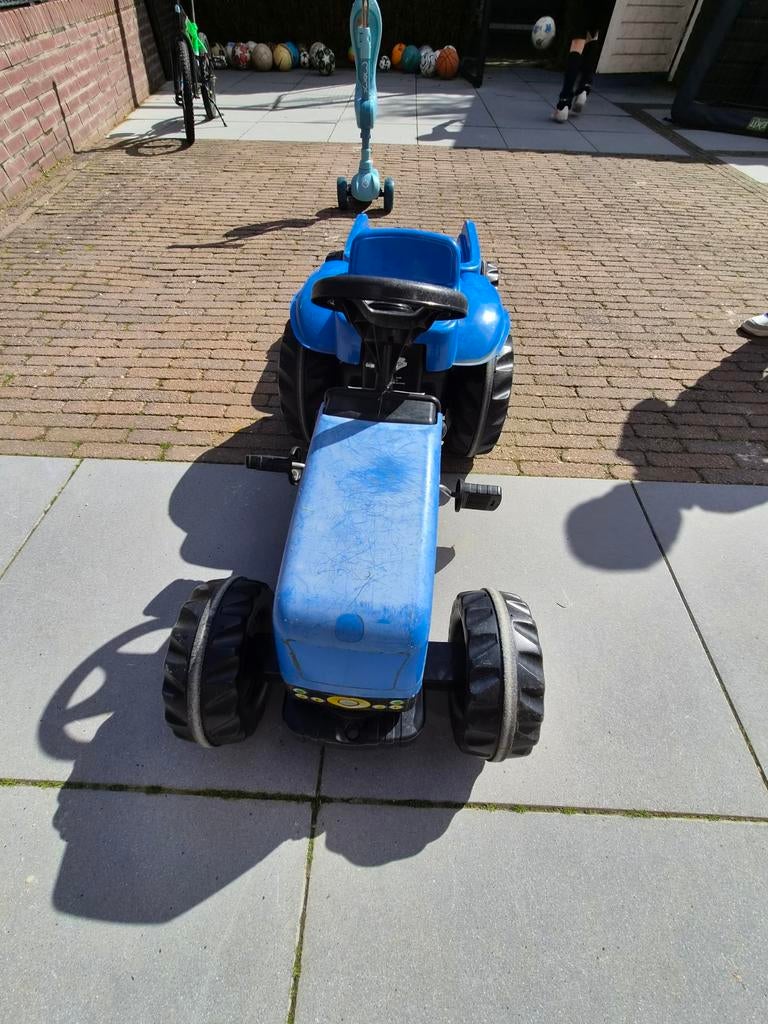 New Holland traptractor met aanhanger, Ophalen