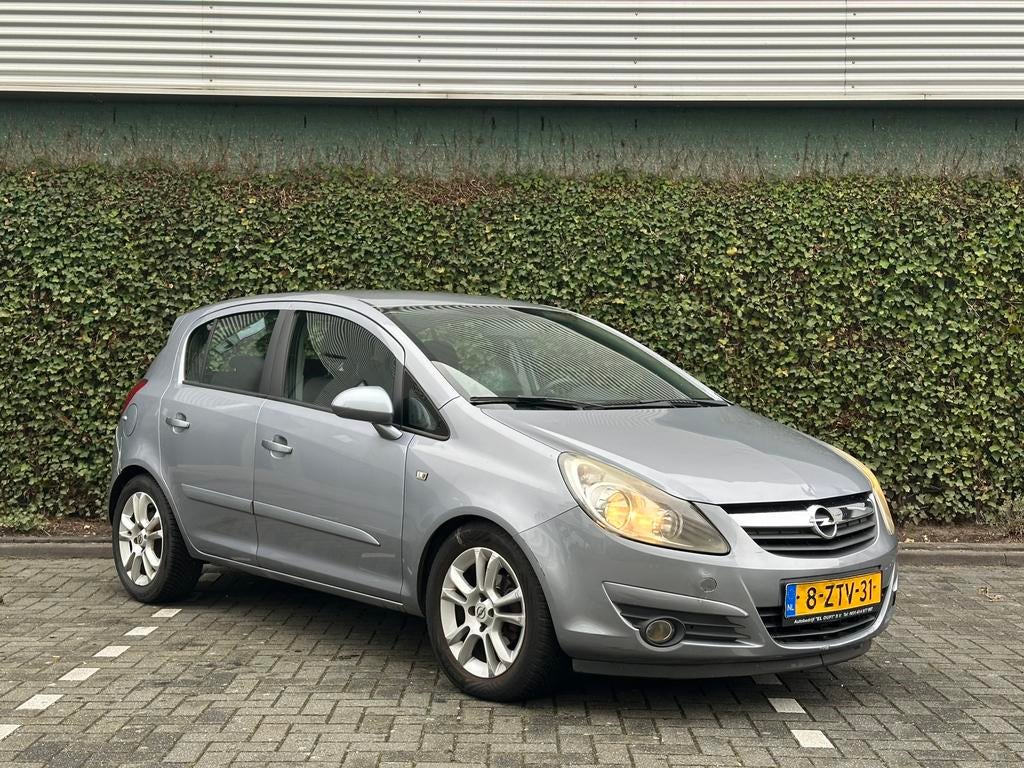 Opel Corsa 1.2 16V 5D WR 2007 Grijs, Auto's, Voorwielaandrijving, 4 cilinders, 1229 cc, 49 €/maand