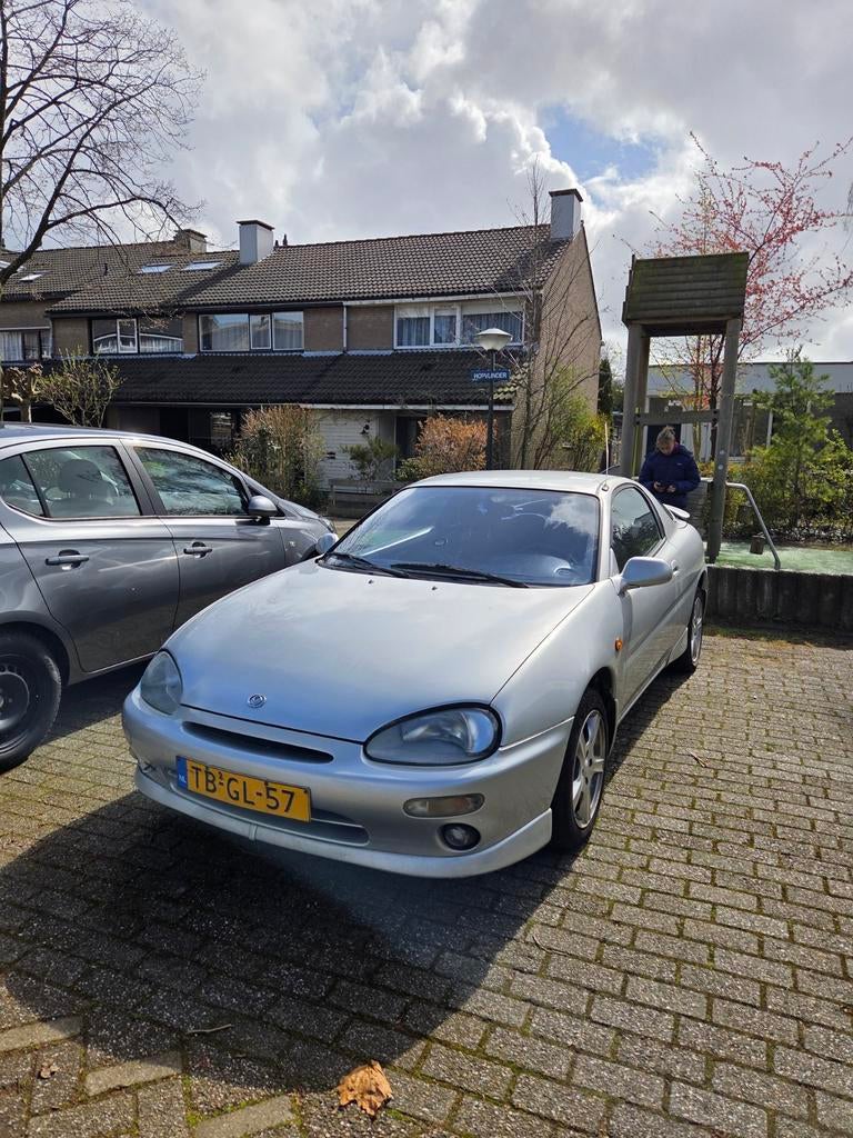 Mazda MX-3 1.6 I Xtreme 16V 1998 Grijs, Auto's, Mazda, Stof, MX-3, 4 cilinders, 49 €/maand