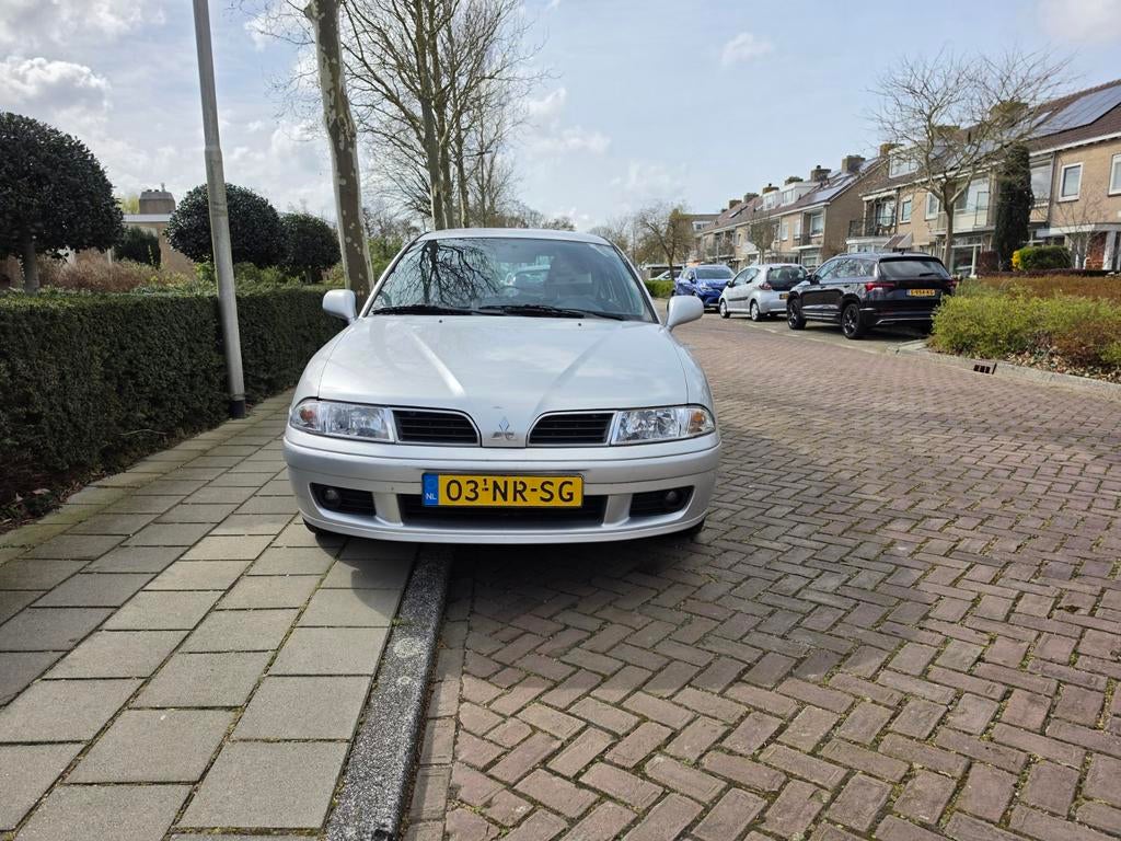 Mitsubishi Carisma 1.8 Shogun SE HB 2004 Grijs, Voorwielaandrijving, 4 cilinders, 1834 cc, 1210 kg
