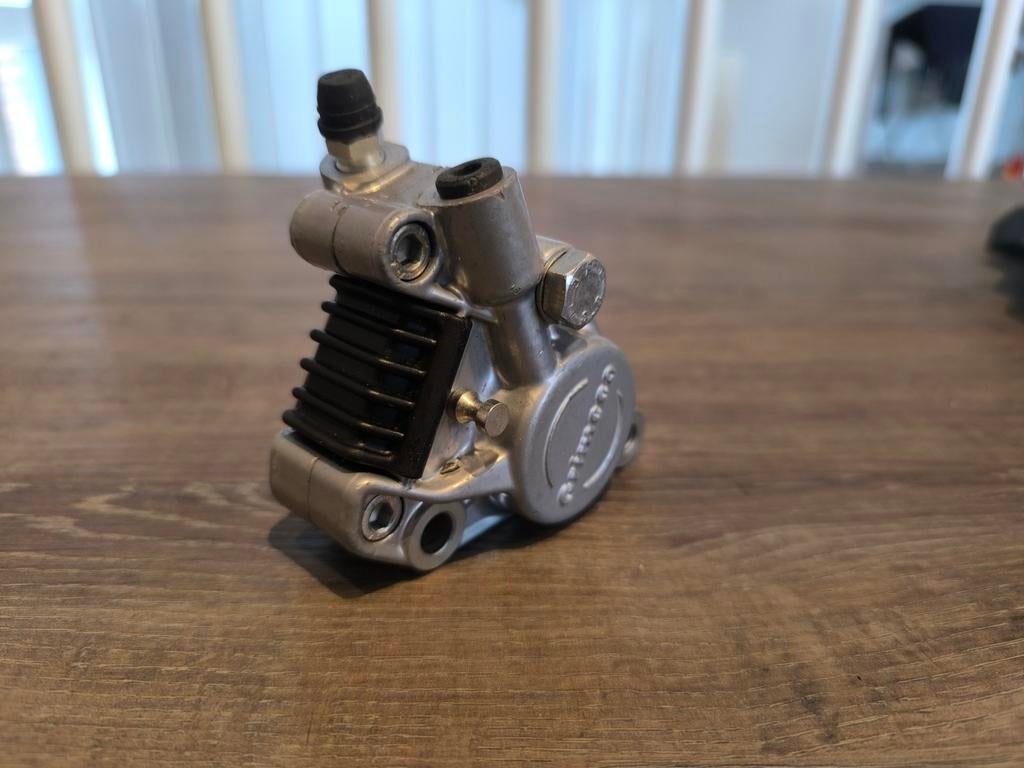 NIEUW NOS Originele Remklauw Grimeca Malaguti Firefox F15, Ophalen of Verzenden, Nieuw, Overige typen, Overige merken