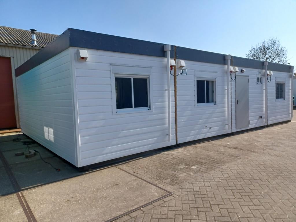 Woonunit 7,5 x 12 meter 3 of 4 slaapkamers te huur, Ophalen