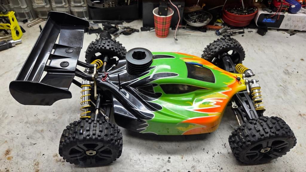 Te koop zeer mooie ishima, Auto offroad, Ophalen of Verzenden, Zo goed als nieuw, Schaal 1:8