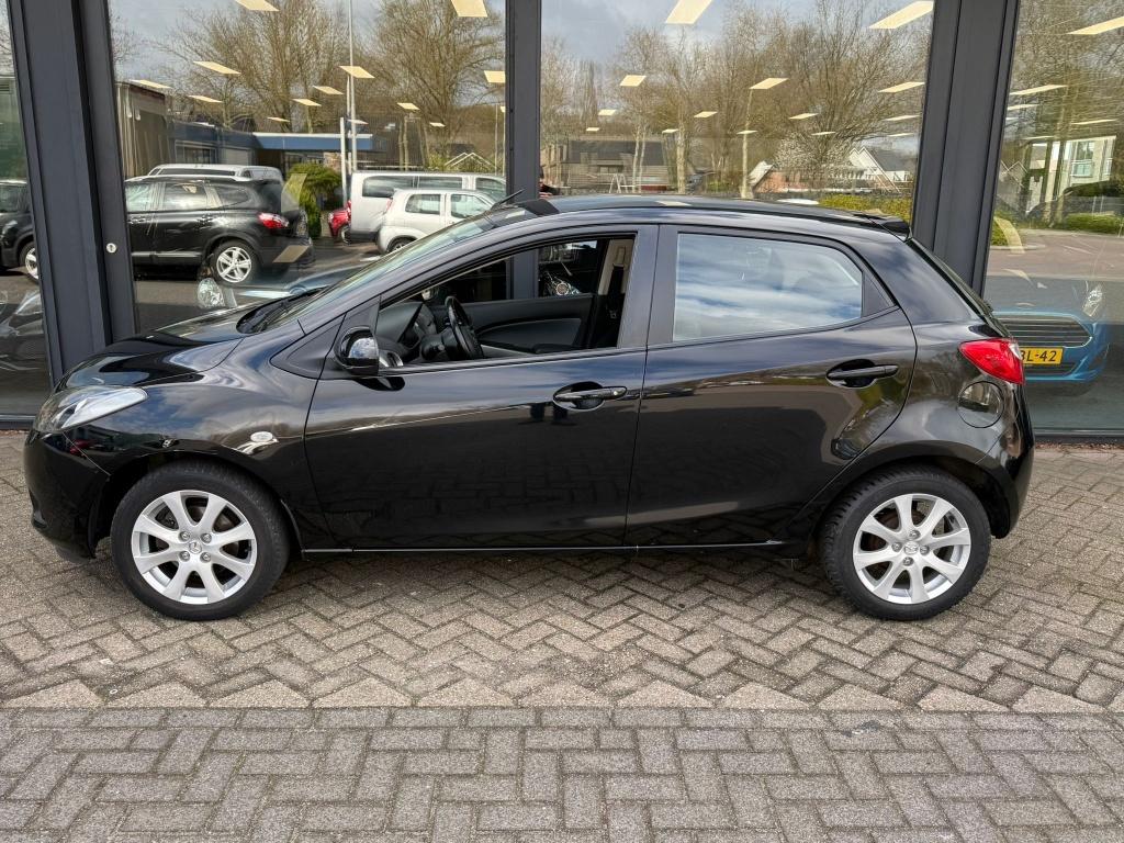 Mazda 2 5 deurs elektrisch pakket! (bj 2009), 0 cilinders, Gebruikt, Zwart, Bedrijf