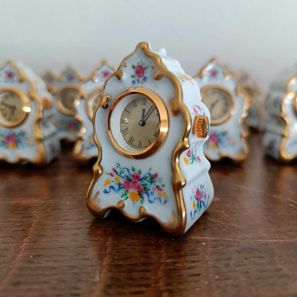 Miniatuur porseleinen klokjes., Antiek en Kunst, Antiek | Klokken, Ophalen of Verzenden