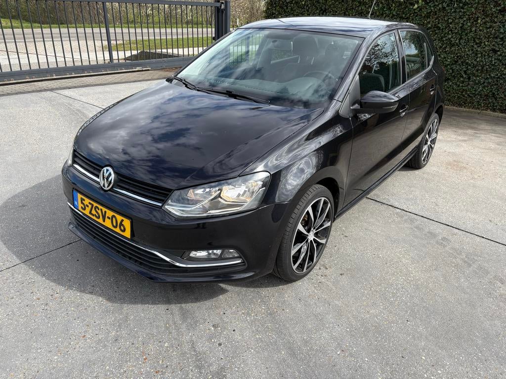 Volkswagen Polo 1.2 TSI 66KW 2014 Zwart, Auto's, Stof, Zwart, 4 cilinders, Zwart