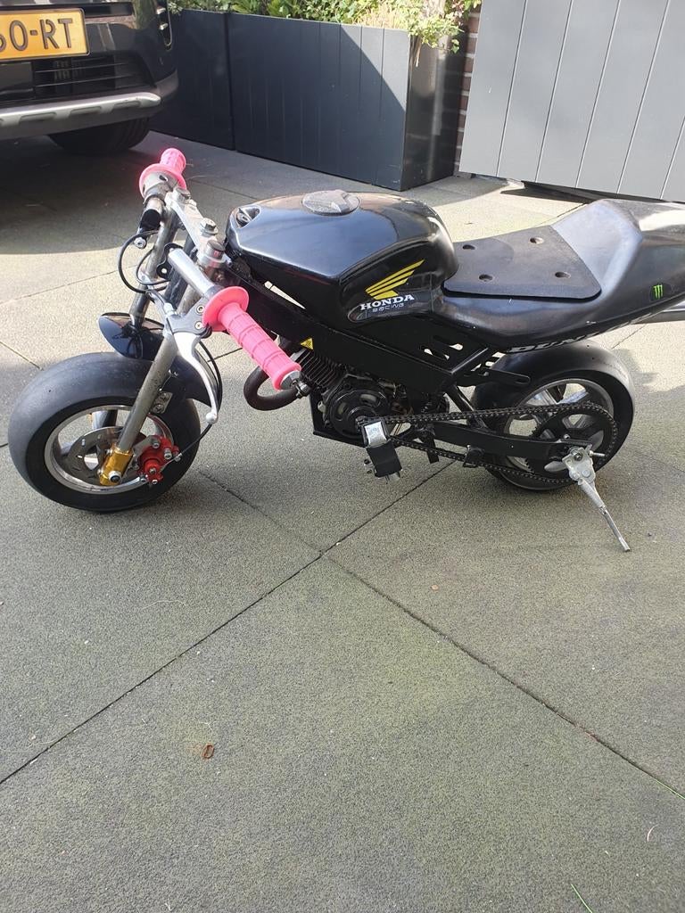 Minibike met opklapbare stapjes nieuwe remmen en cabarateur, Ophalen of Verzenden