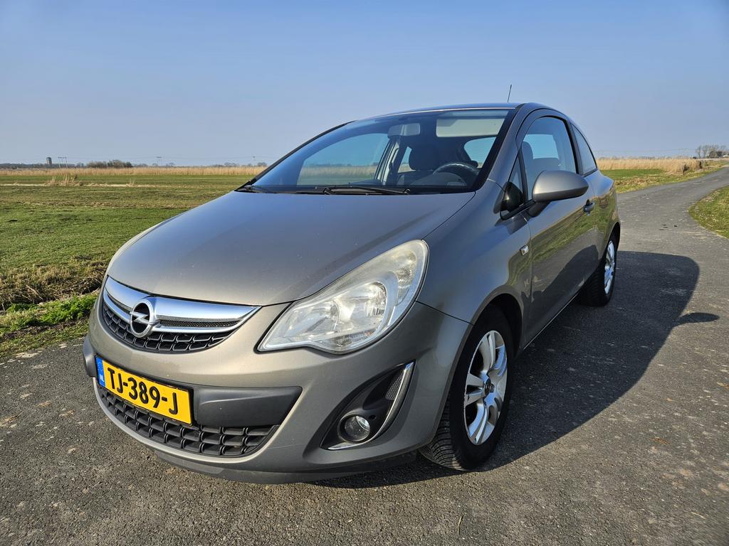 Opel Corsa 1.2 16V 3D 2011 Bruin, Auto's, Voorwielaandrijving, 450 kg, 40 €/maand, Bruin