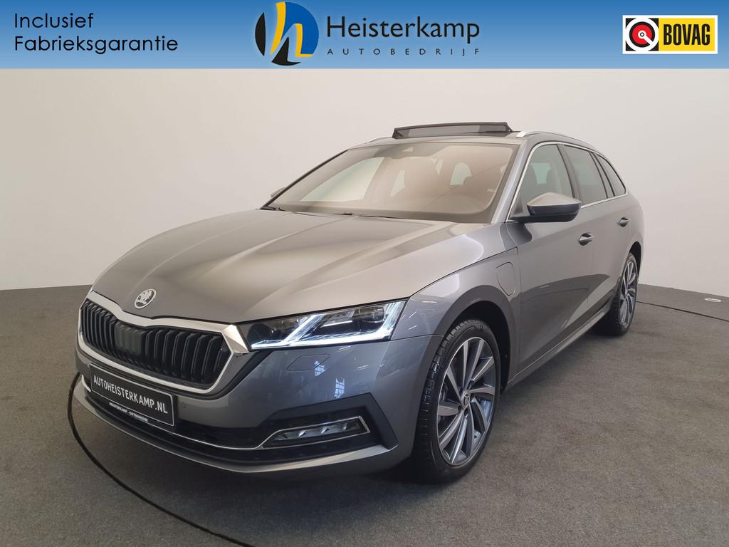 Skoda Octavia Combi 1.4 TSI 204pk DSG/AUT iV PHEV Style Busi, 12 maanden, Stof, Gebruikt, Zwart
