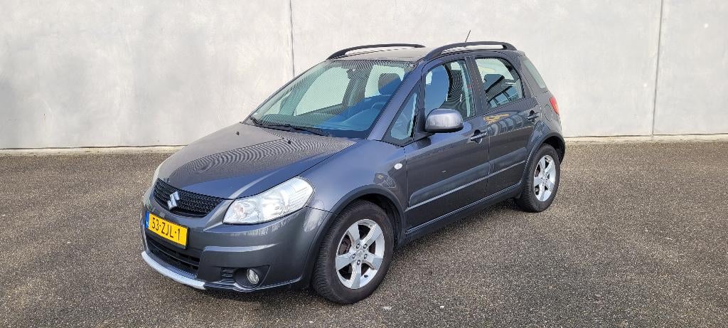 Suzuki SX4 1.6 2009 Grijs Suzuki SX4, Auto's, Voorwielaandrijving, Stof, 4 cilinders, SX4