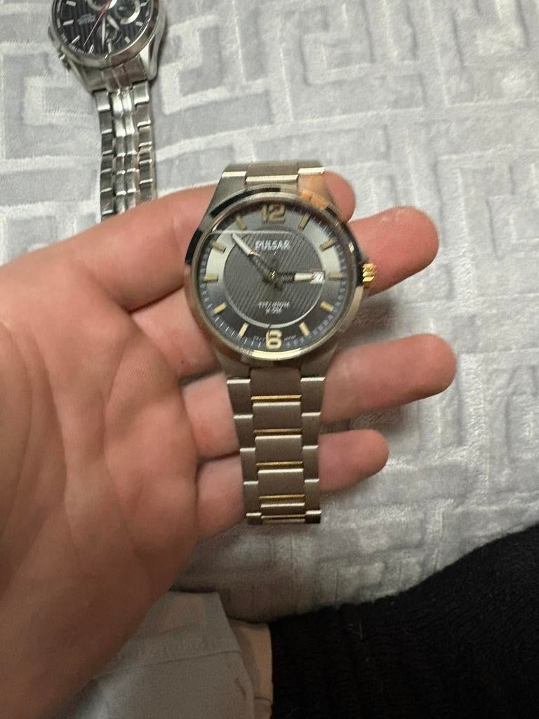 Pulsar titanium, Ophalen of Verzenden, Zo goed als nieuw