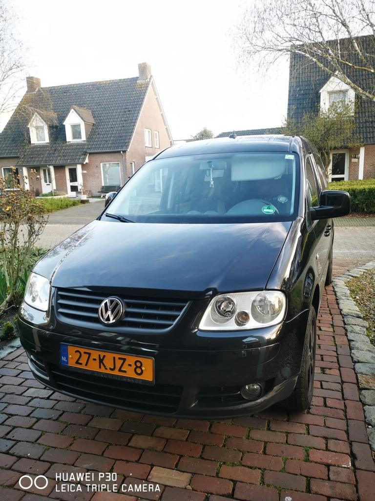 Volkswagen Caddy 1.6 75KW Maxi Combi 2010 Zwart, Auto's, Bestelauto's, Voorwielaandrijving, 4 cilinders, Volkswagen, 7 stoelen