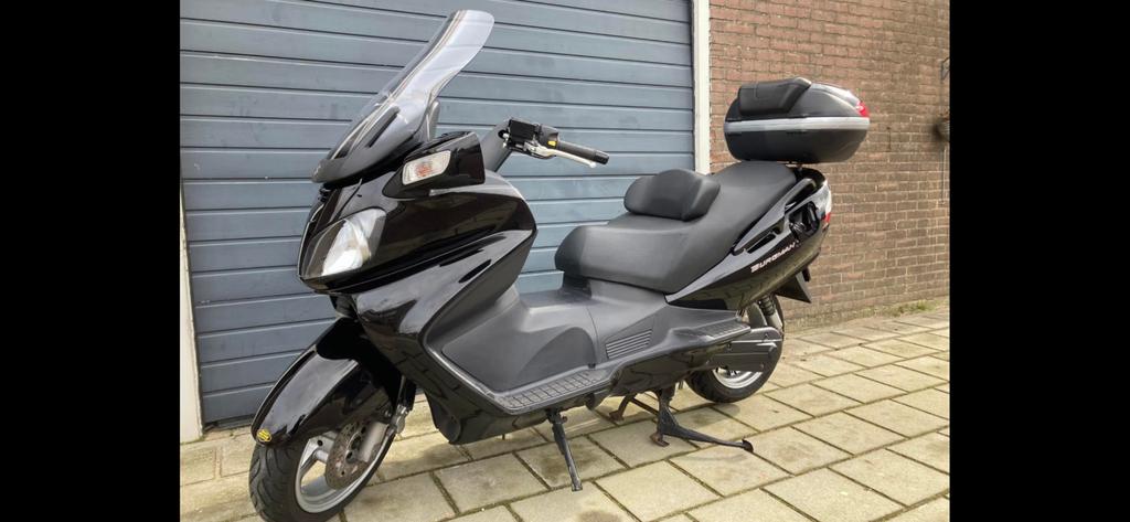 Suzuki Burgman 650 2013.  55000 km, Motoren, Motoren | Suzuki, Handvatverwarming, Motorrijbewijs A, Particulier, Meer dan 35 kW