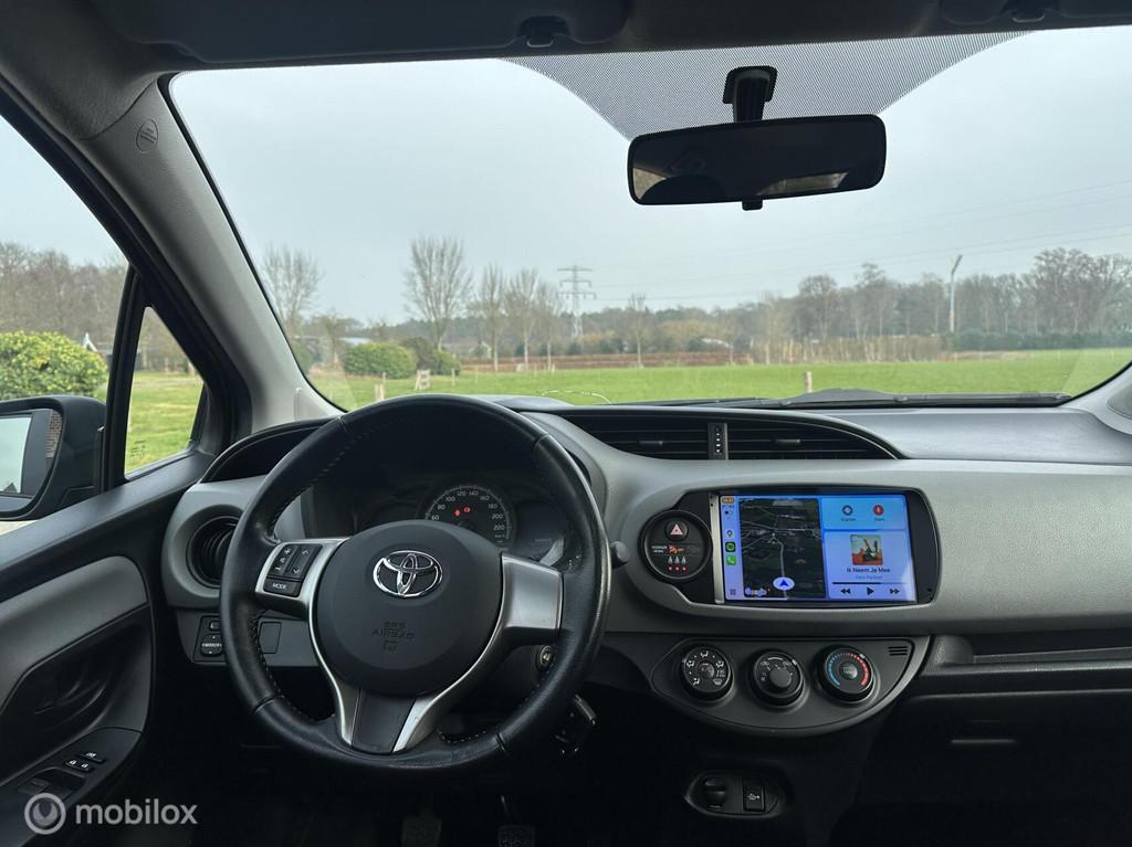 ✅Toyota Yaris 1.0 VVT-i Business Plus Trekhaak Navi, Voorwielaandrijving, Stof, Gebruikt, Zwart