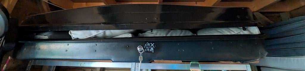 Renault dakkoffer met dakdragers voor Captur (2013), Ophalen