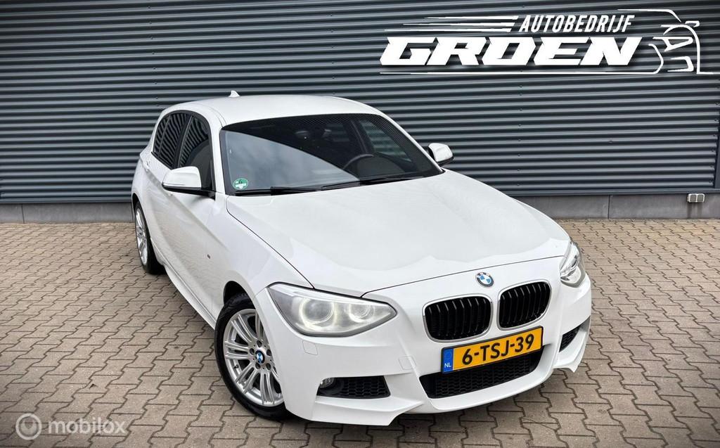 BMW 1-serie 116i High Executive M-PAKKET|PDC|STOELVERWARMING, Gebruikt, 4 cilinders, Wit, Origineel Nederlands