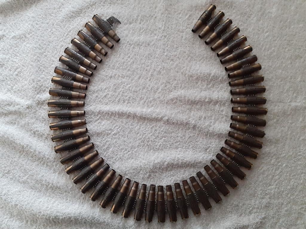 Hulzenband MG Duits(ONKLAAR) messing, Verzamelen, Ophalen of Verzenden, Landmacht, Duitsland, Hulzen of Bodemvondsten