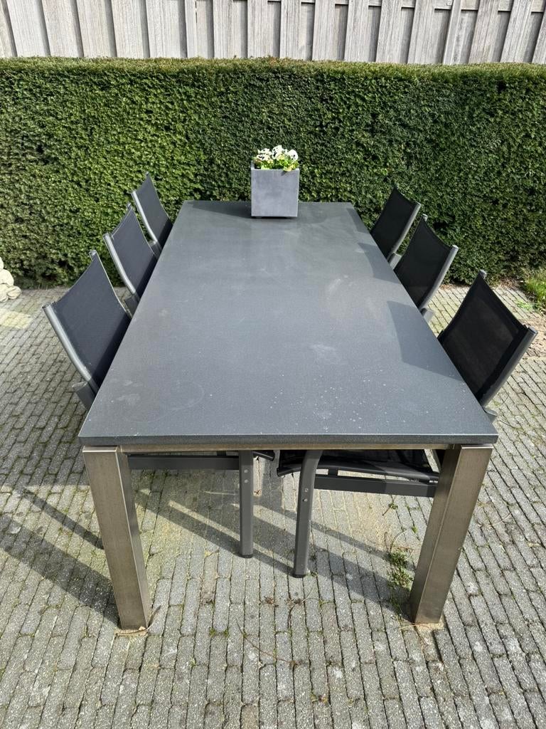 Belgisch hardstenen tuintafel met RVS onderstel + 6 stoelen, Ophalen, Gebruikt, Rechthoekig, Rvs