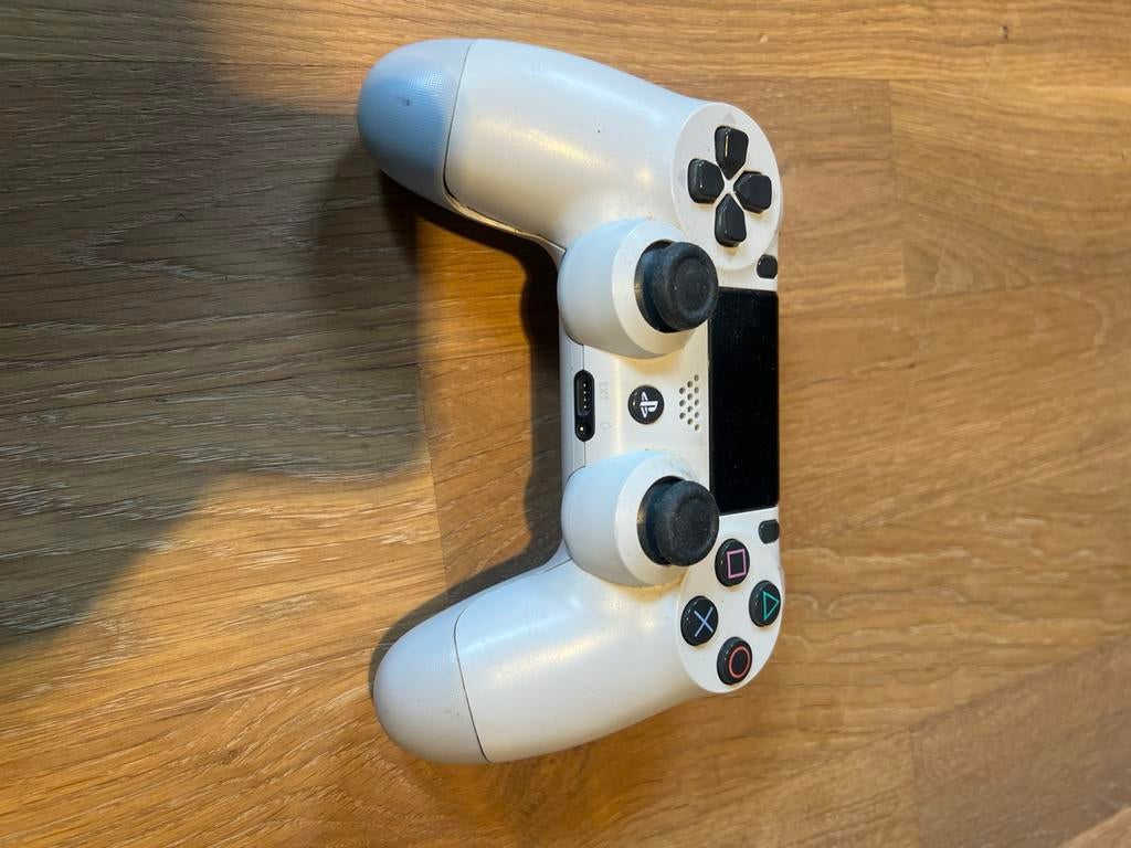Playstation 4 dualshock 4 wit controller, Spelcomputers en Games, Ophalen of Verzenden, Zo goed als nieuw, Met 1 controller, Original