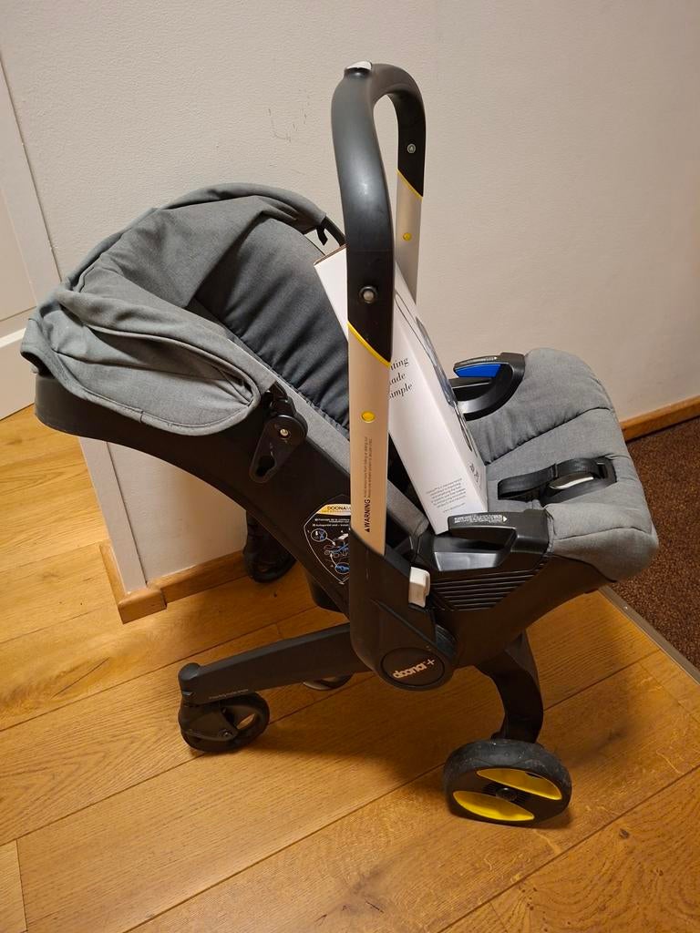 Doona Kinderwagen met Isofix en regenhoes, Kinderen en Baby's, Kinderwagens en Combinaties, Gebruikt, Met autostoeltje, Ophalen