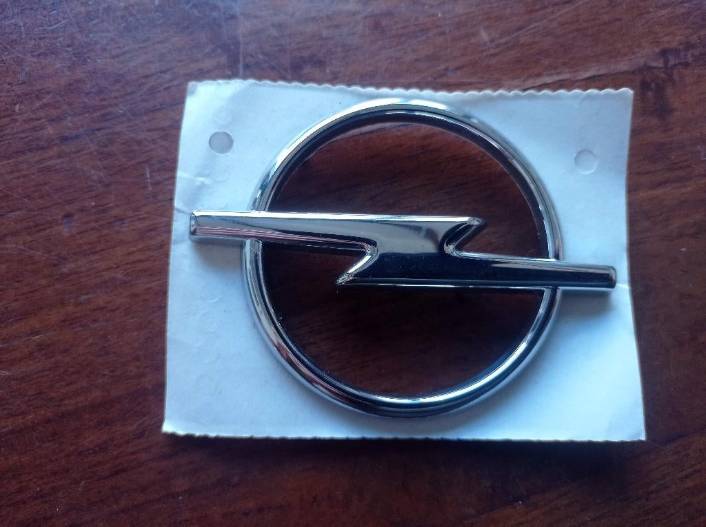 opel logo voor auto nieuw origineel onderdeel blitz embleem, Auto-onderdelen, Opel, Nieuw, Ophalen of Verzenden, Bumper