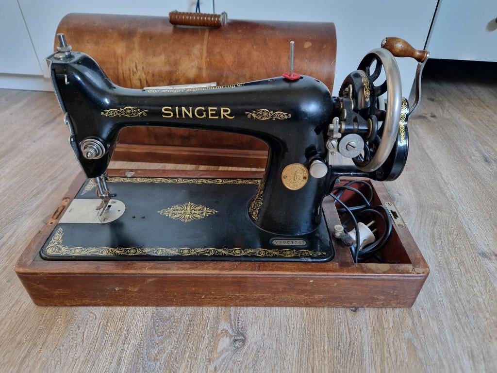 Singer antieke naaimachine, Ophalen