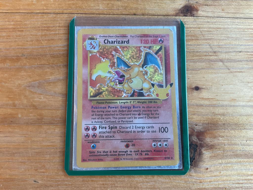 Pókemon Charizard 4/102, Ophalen, Nieuw, Losse kaart