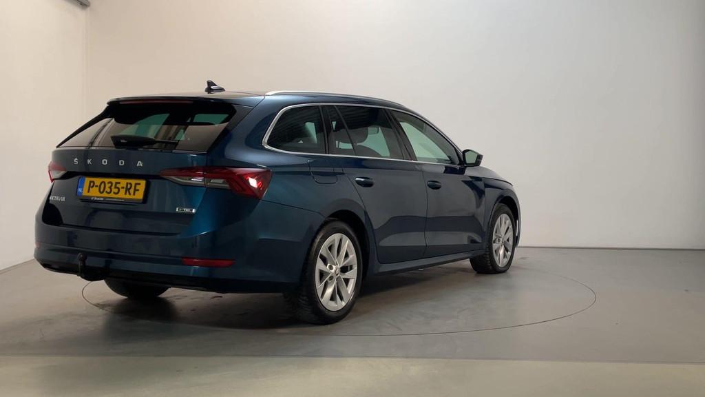 Skoda Octavia Combi 1.0 e-TSI DSG Business Edition Plus Came, Stof, Gebruikt, Met garantie (alle), Blauw