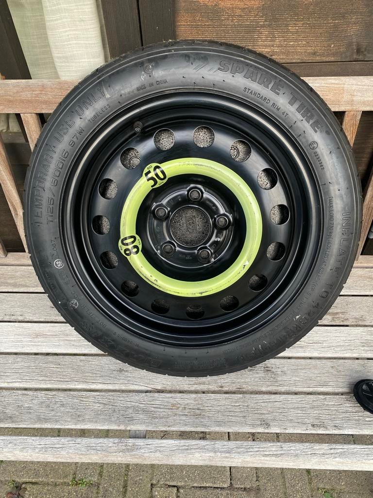 Reservewiel (Thuiskomer)., Ophalen