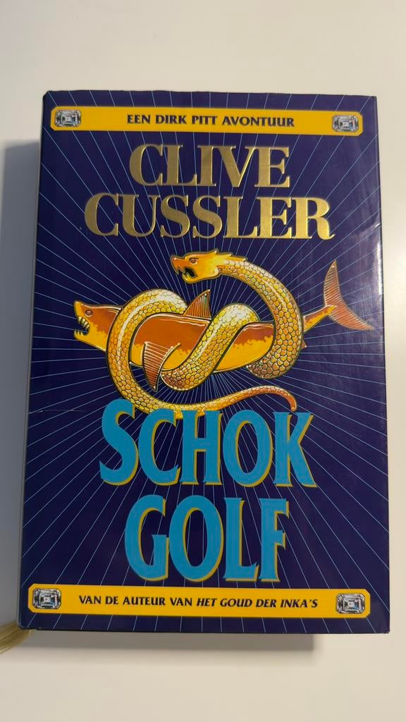 Schokgolf - Clive Cussler, Ophalen of Verzenden, Zo goed als nieuw
