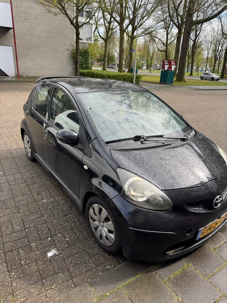 Toyota Aygo 1.0 12V Vvt-i 5DRS 2007 Zwart, Voorwielaandrijving, 4 stoelen, Handgeschakeld, Particulier