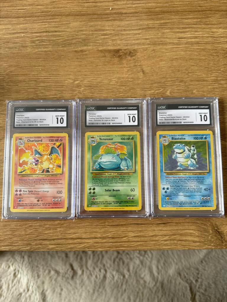 Charizard, Blastoise, Venusaur CGC 10, Ophalen of Verzenden, Zo goed als nieuw, Meerdere kaarten