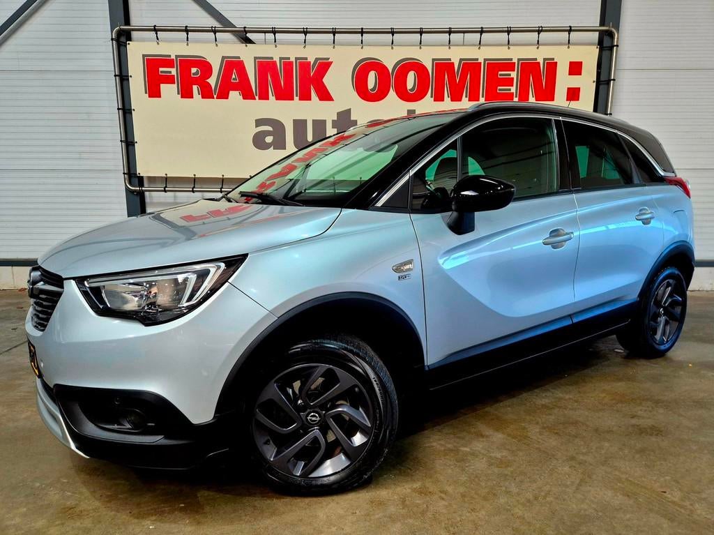 Opel CROSSLAND X 1.2 Turbo 110PK 120 Jaar Edition + LED|Navi, Gebruikt, Lichtsensor, Bedrijf, 600 kg