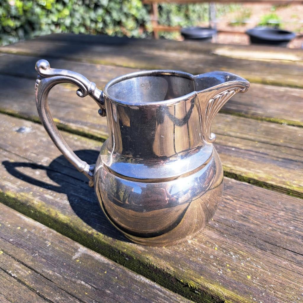 Zilveren melkkannetje van Gero Zilvium, Ophalen