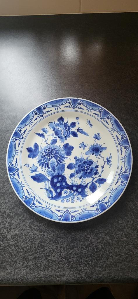 Delfts Blauw bord, Ophalen