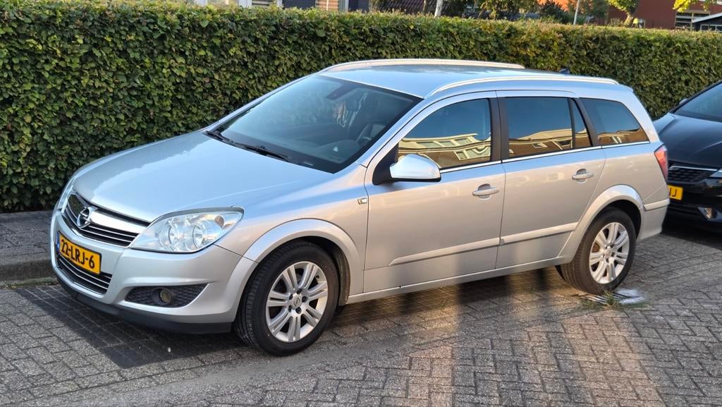 Opel Astra 1.6 16V 85KW St.wgn. 2010 Grijs, Voorwielaandrijving, 15 km/l, Zwart, Stationwagon