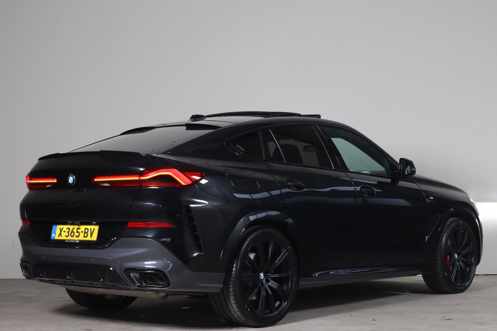 BMW X6 xDrive40i M-Sport NL-Auto! Bow.Wil I Swarovski I Sky, Auto's, Gebruikt, Euro 6, 138 €/maand, Zwart