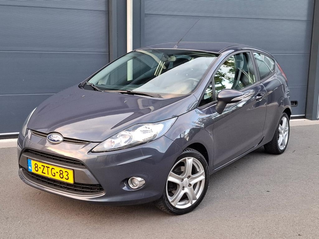 Ford Fiësta 1.25 Champion 44KW 3DR 2012 Grijs, Voorwielaandrijving, Stof, 4 cilinders, Bedrijf