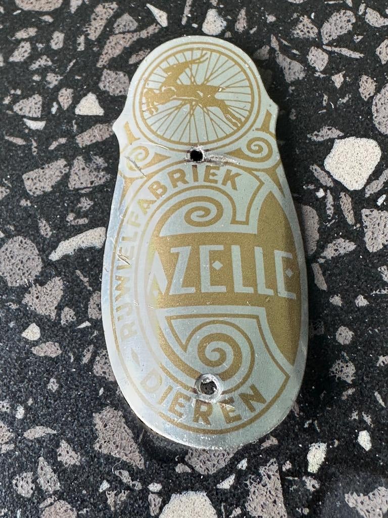 Gazelle balhoofd plaatje. Rijwiel balhoofdplaatje bruin., Verzamelen, Merken en Reclamevoorwerpen, Ophalen of Verzenden, Gebruikt