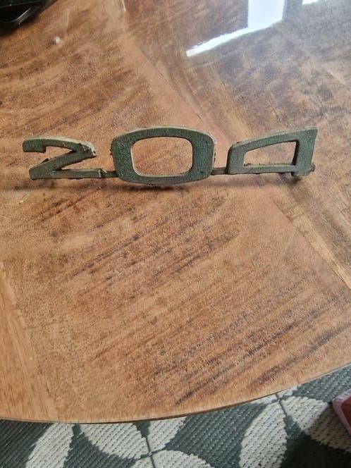 Embleem 204, Ophalen of Verzenden, Gebruikt, Auto's