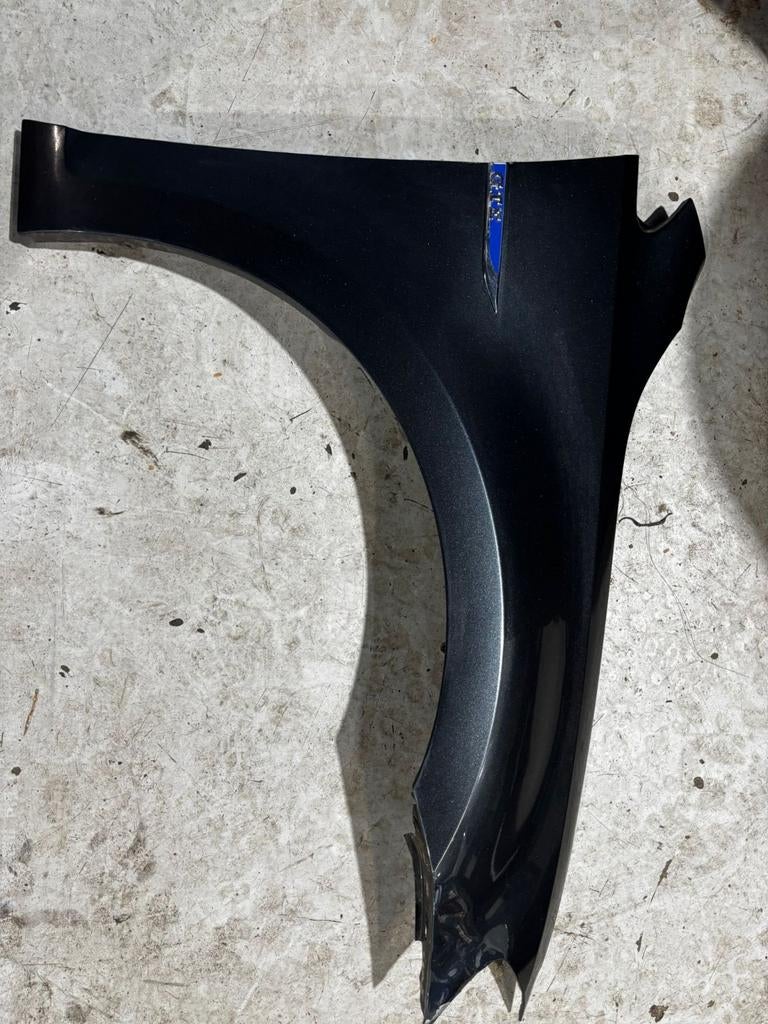 Voorscherm spatbord rechts golf 7 met schade kleurnr. aw9, Gebruikt, Volkswagen, Ophalen of Verzenden, Spatbord