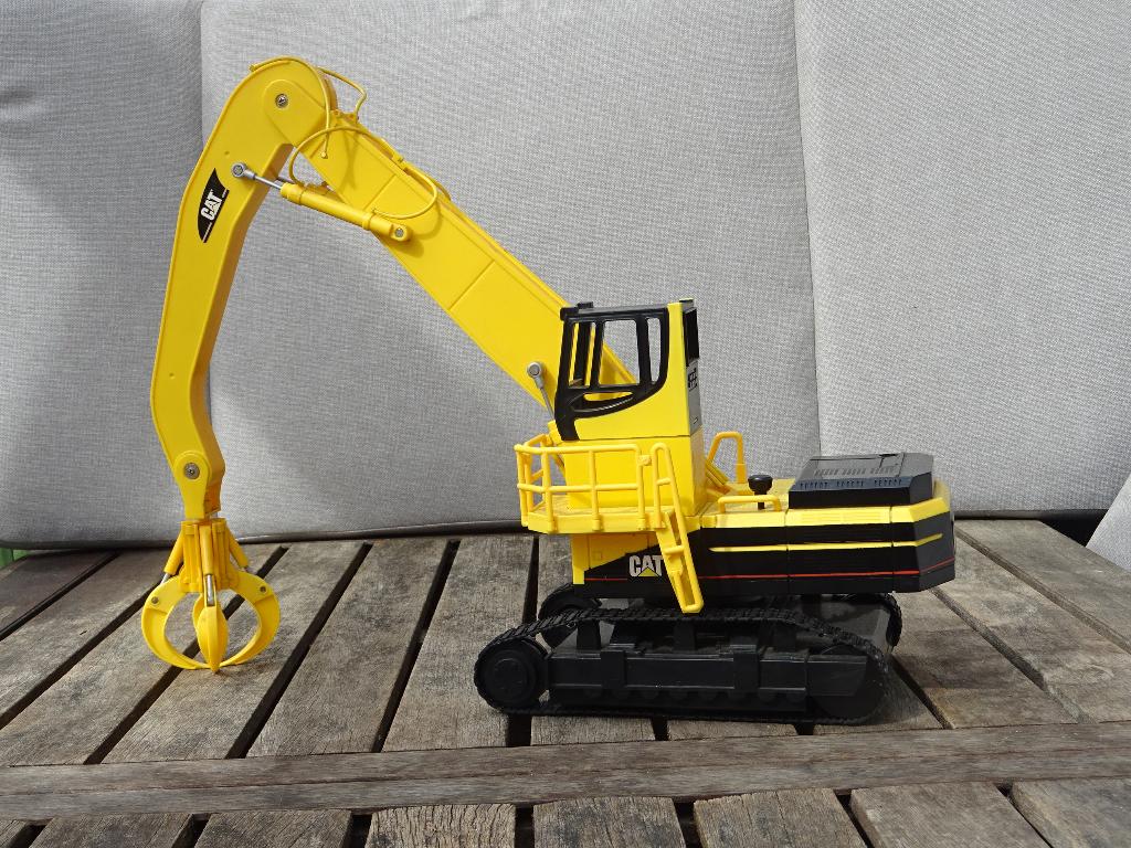 Caterpillar kraan met poliep ex-vitrine - nooit mee gespeeld, Ophalen of Verzenden, Nieuw