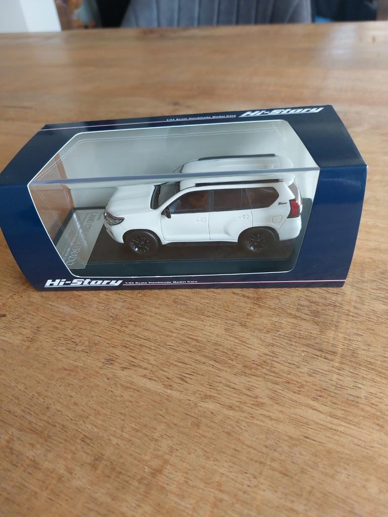 MODELAUTO 1-43 HI-STORY TOYOTA LANDCRUISER PRADO WIT, Ophalen of Verzenden, Zo goed als nieuw, Auto, Overige merken