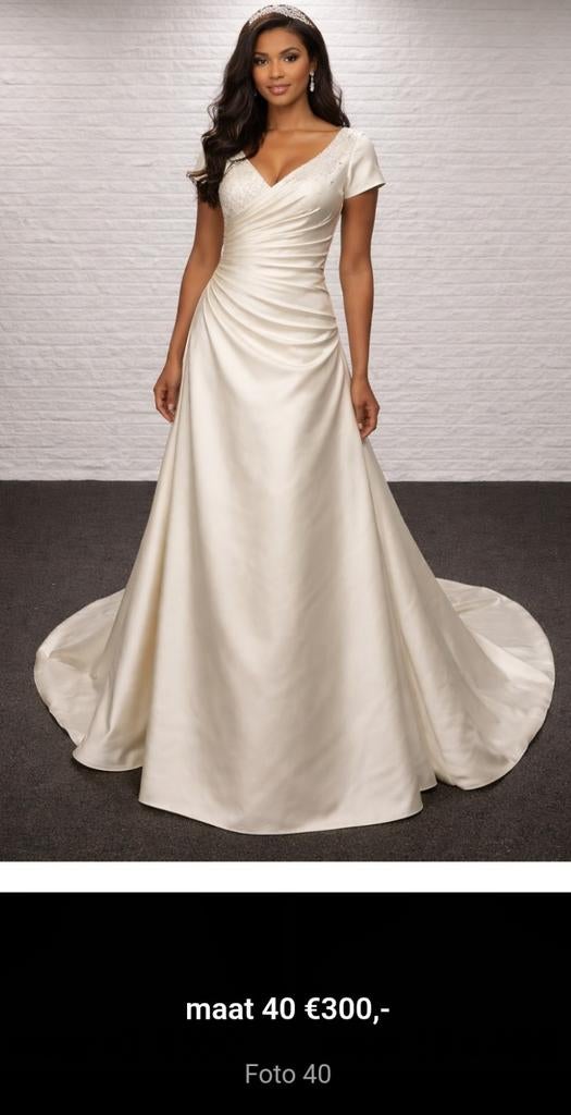 Nieuwe trouwjurk maat 40, Ophalen