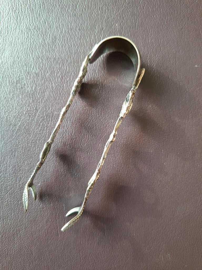 Art nouveau Suikerklontjestang, Ophalen